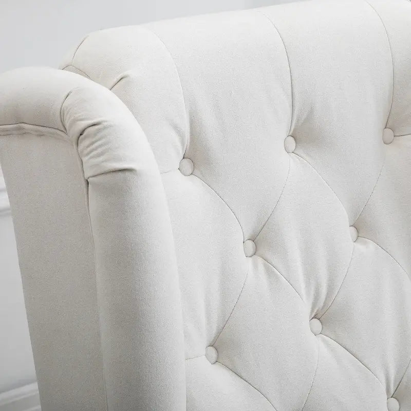 Sillón decorativo de respaldo alto color blanco crema con botones capitonados